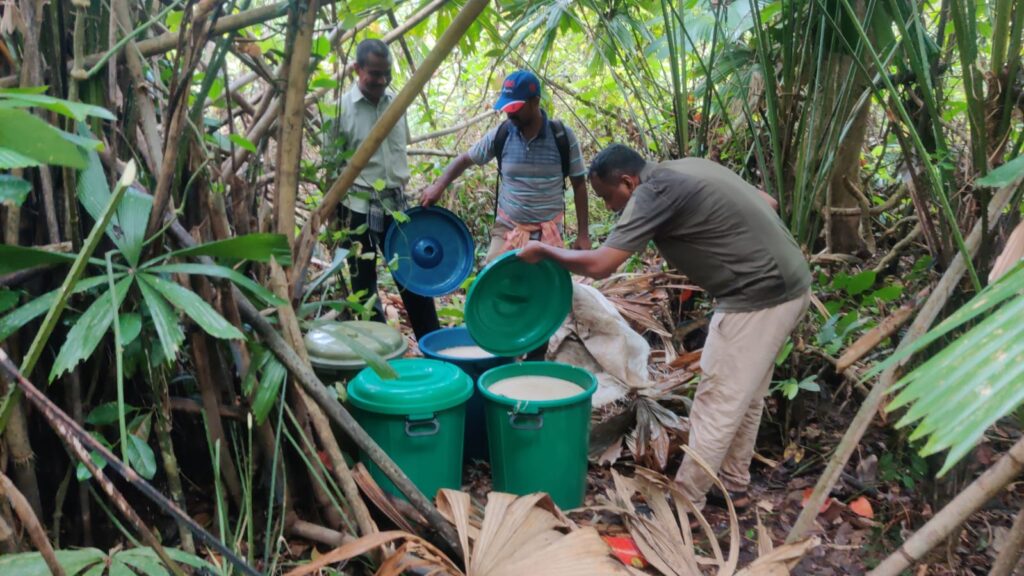 Police Team examined the illicit Liquor