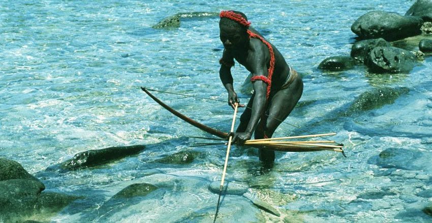 One of Vulnerable Tribal man fishing with Arrows